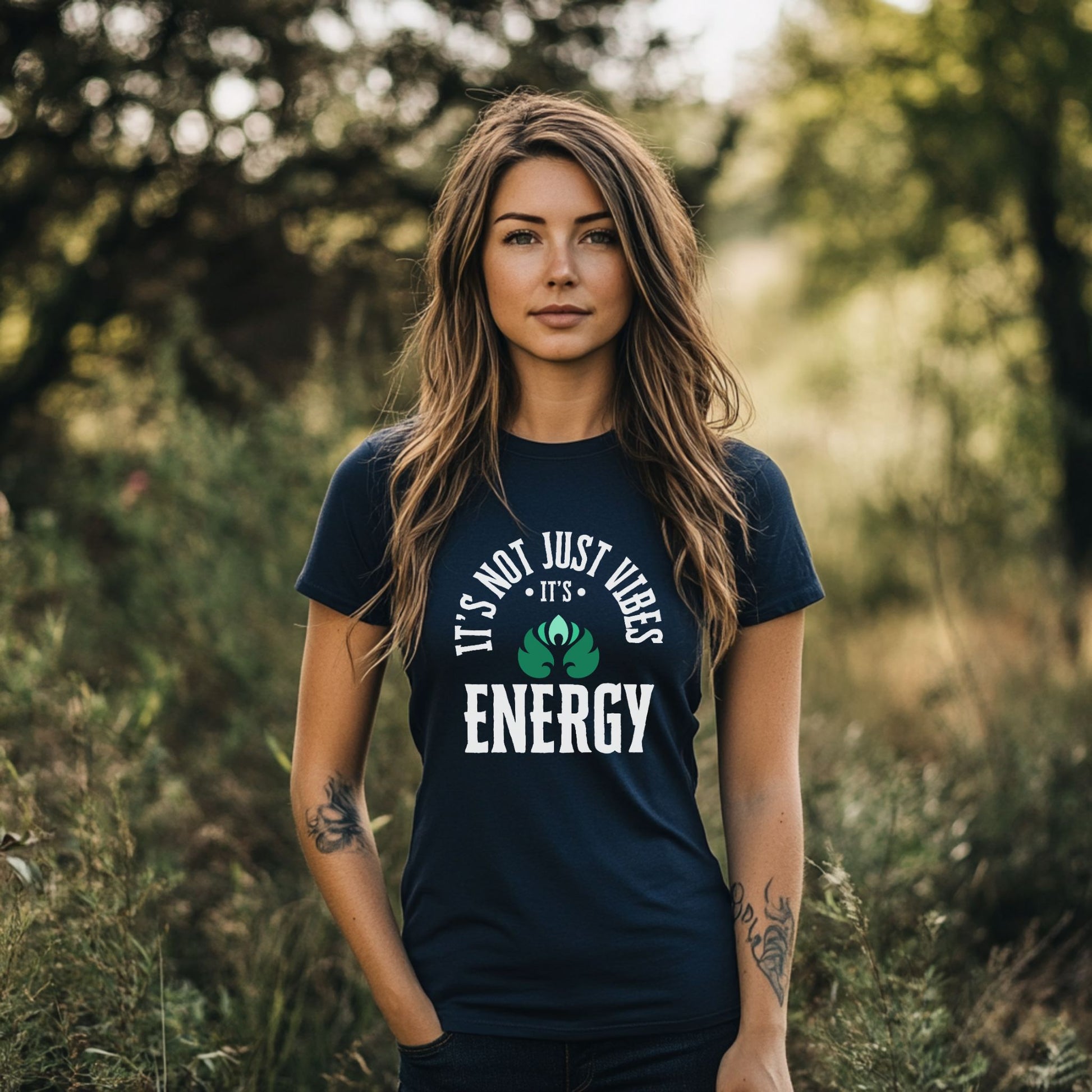Woman wearing a t-shirt with a motivational quote in a natural setting – Lunar Lightwear conscious clothing