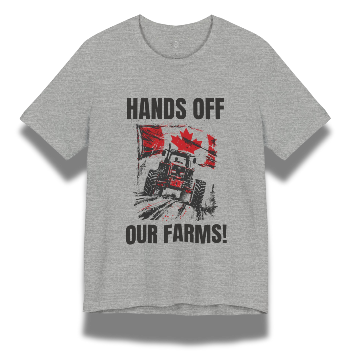 Gray t-shirt with a graphic design featuring a tractor and Canadian flag, text 'HANDS OFF OUR FARMS!', on a white background.